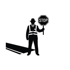 Traffic controller in silhouette holding a stop sign with a long shadow silhouette