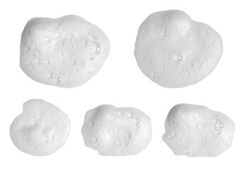 White foam texture in various smear shapes for skincare, soap, cleansing products, and cosmetic presentation, highlighting bubbles, softness, and clean beauty design for product visuals.