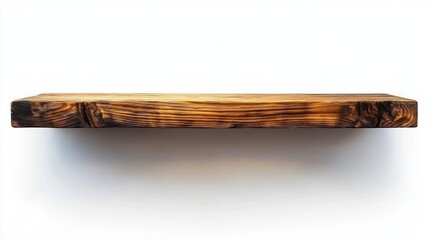 single floating wooden shelf with charred burnished grain mounted on a white wall casting a soft shadow, minimalist rustic modern vibe evoking calm warm simplicity