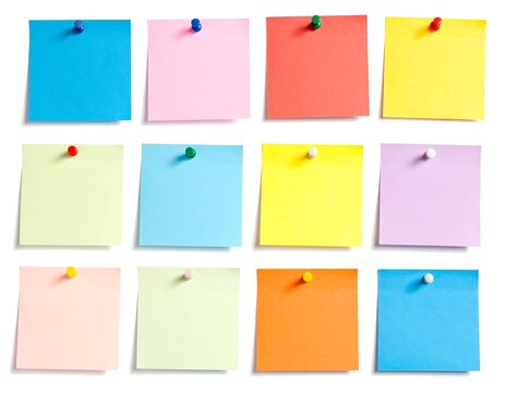 Twelve colorful square sticky notes pinned to a white background