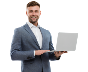 Businessman standing in office holding laptop smiling confidently