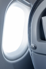 Hanging on the plane.