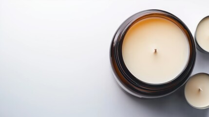 Candlelight Serenity A Top-Down View of Lit Candles on a Minimalist White Backdrop