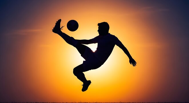 Silhouette of a male soccer player performing a bicycle kick against a vibrant sunset sky