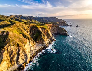 Aerial view of dramatic coastline with cliffs and ocean waves