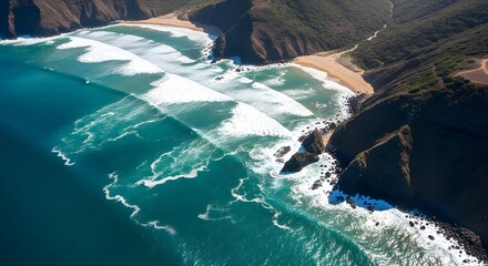 Aerial view of a coastline with powerful ocean waves crashing on a sandy beach and rocky cliffs