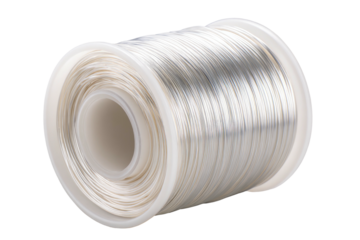 Spool of silver wire, plastic container, angled view