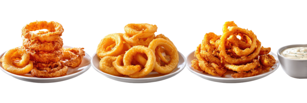 Crispy, golden-brown onion rings on small white plates, with a side of creamy dipping sauce