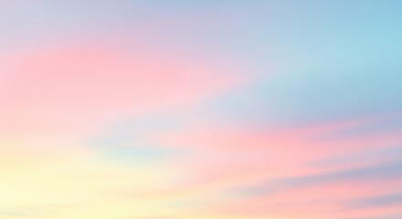 Obraz premium Captivating sunrise sky with pastel pink, blue, and yellow hues blending seamlessly creating a
