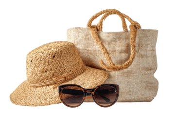 Summer beach essentials straw hat, sunglasses, and tote bag, set against a dark background