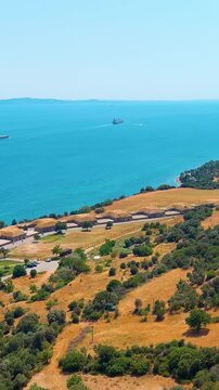 Vertical video. Kilitbahir, Turkey. The historic Mecidiye Bastion on the Gallipoli Peninsula, a 19th-century Ottoman fortification overlooking the Dardanelles Strait. Aerial view, Point of interest. 