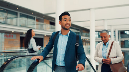 Businessman, escalator and airport for travel with luggage, thinking and walk for global departure. Person, business trip and baggage on auto stairs, immigration or international flight at terminal