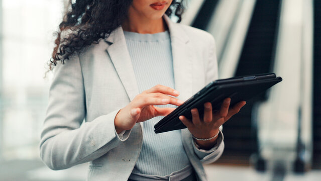 Airport, employee and hands with tablet, research and checking travel schedule on website or online. Business trip, scroll and person with technology for flight status, info and planning for project - Powered by Adobe