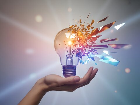 Exploding light bulb symbolizing creative idea bursting forth