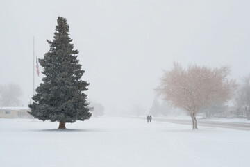 american flag gently waves beside beautifully decorated christmas tree on snowy street