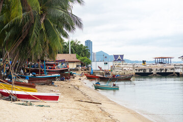 Vibrant Fishing Boats on Sandy Shoreline