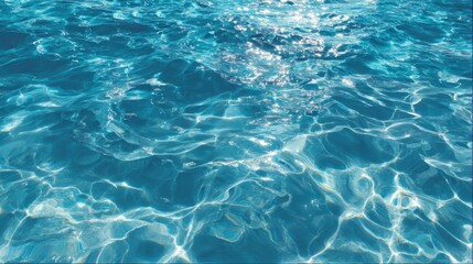Obraz premium Sunlight reflects off the surface of crystal clear ocean water in a tropical setting. The image captures the calming movement and vibrant blue hues, creating a serene atmosphere.
