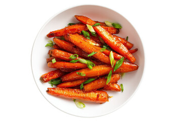 Overhead view of roasted, glazed carrots with green onion garnish in a white bowl