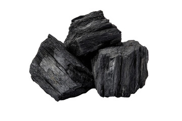 Obraz premium Close-up of three rough, dark charcoal briquettes piled on a black background