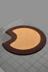 Semi-Circle Coir Doormat with Brown Border on Gray Floor (3D Render)