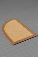 Semi-Circle Coir Doormat with Brown Border on Gray Floor (3D Render)