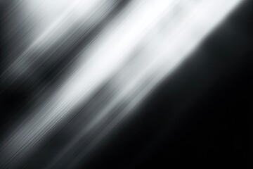 Diagonal light streaks fade from white to black, soft motion