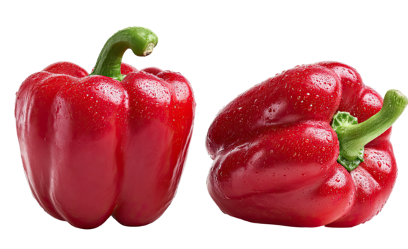 Two vibrant red bell peppers glisteni?ng with water droplets