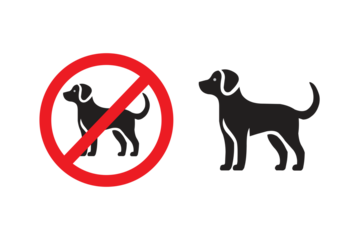No dogs allowed sign on a wall. Image depicts a prohibition sign