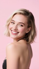 Obraz premium White Woman with Bob Haircut Smiling Over Shoulder on Pink