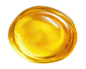 Close-up macro view of a viscous, golden, transparent liquid sphere