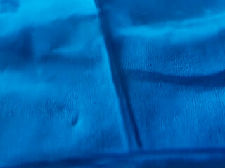 Top view, Abstract blurred dark painted blue color paper texture background for graphic design, wallpaper, illustration, card, brochure, gradient, aqua colour