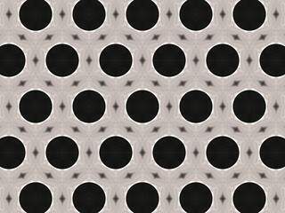 A pattern of black circles and geometric shapes repeats on beige.