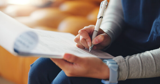 Nurse, hands and writing with documents for medical prescription or diagnosis in home. Closeup, caregiver or taking notes with clipboard for medication checklist, patient history or health insurance