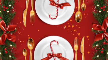 Fototapeta na wymiar Christmas plate settings with candy canes and golden cutlery for festive dining. White dishes with red bows, pine branches, berries and confetti - holiday table arrangement for seasonal feast or party