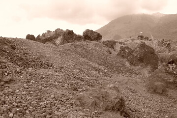 Toned Rough Volcanic Rock Landscape Scenery Under Cloudy Sky Scape