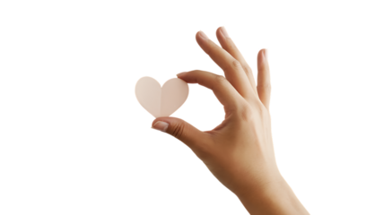 A hand holding a small paper heart on a transparent background