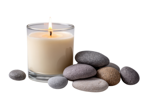 Lit white candle in glass beside smooth grey and brown stones on black background flame cream, Isolated On White Background, Png Transparent - Powered by Adobe