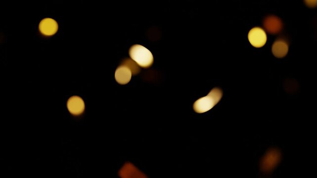 gold dust bokeh particles background. fairy dust shimmer particles, perfect for video effects, transitions, festive design, Bokhe Particle Flaying On Dark Background. Particle Floating