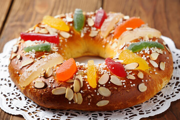 Traditional Rosca de Reyes cake with almonds and candied fruit king cake sweet bread