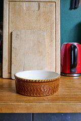 cutting boards and empty salad bowl