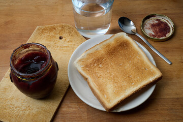 Toasted bread and raspberry jam