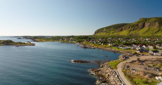 Drone Capturing Melbu Town Harbor, Houses and Dramatic Hadsel Landscape in Norway