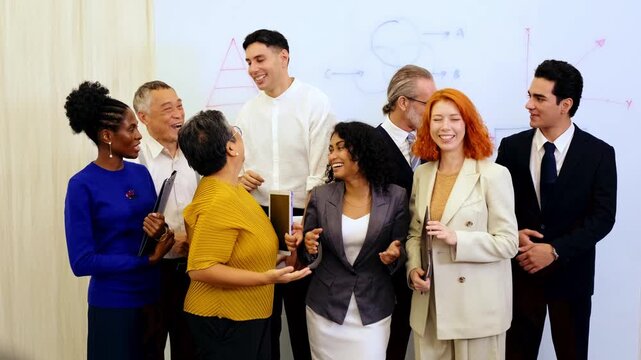 Diverse colleagues celebrate business success in modern office, smiling and cheering by whiteboard. Corporate scene highlights teamwork, leadership, multicultural spirit, and professional unity. 4k