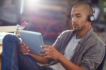 Design, headphones and tablet with game engineer in office for software update or testing. App,...