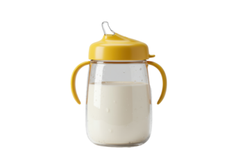 borosilicate glass sippy cup filled with creamy infant formula, featuring a vibrant mustard-yellow lid and silicone spout, macro focus on white background. concept of essential early childhood