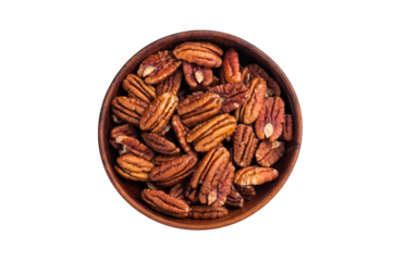 Shelled pecan nuts in a wooden bowl on a clean white background creating a simple natural ingredient shot ideal for culinary and healthy food themes