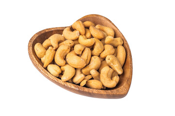 Cashew nuts in a wooden bowl on a clean white background creating a bright minimal ingredient