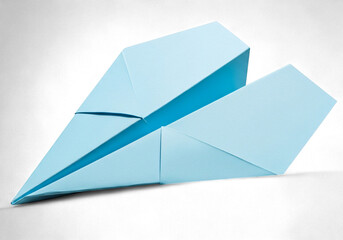 Light blue paper airplane soars with imagination, a symbol of dreams and childhood adventure, ready for take off and inspiring creative journeys, perfect for educational projects