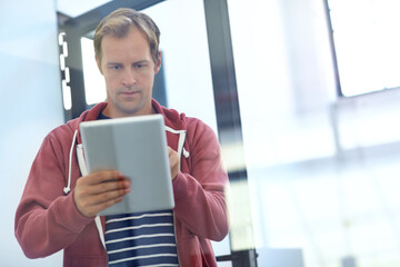 Journalism, startup or man by door with tablet, reading email or deadline schedule for article draft. Review agenda, proofreading story or journalist with tech for editing, research ideas or submit