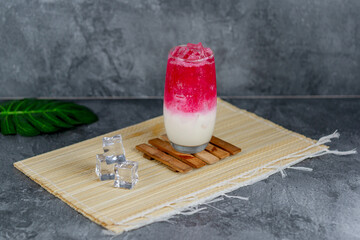 Red milk soda is a colorful, sweet, and creamy drink combining red syrup, milk, and soda over ice for a vibrant, fizzy refreshment. Popular at parties and loved for its unique flavor and presentation.